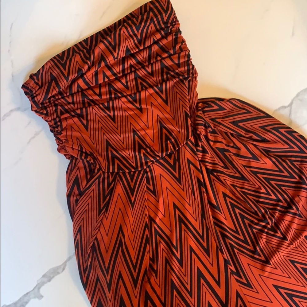 Black and orange sleeveless tribal jumpsuit